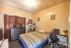 36 Herbert Street Tumut NSW 2720 $335,000 Positioned on a low maintenance allotment only a few moments' drive to town, you will love the flexibility of this diverse two-bedroom, two living area cottage style home on Herbert. Offering a diverse floor plan that can be easily converted to a third bedroom, yet still keeping the open style living area, your options here really are unlimited. Do not miss your opportunity to secure this adaptable cottage style home, call today to book your inspection! Premiere Features: - Two good sized bedrooms (easily adapted to three) - Main bathroom with combined shower over bath, single vanity and toilet - Combined laundry with second bathroom option with disability friendly shower - Fully functional eat in style kitchen with electric cooktop, ample bench space, tiled splash back throughout and great storage options overlooking the rear yard - Formal lounge with window unit air conditioning, easily converted to third bedroom - Large open plan living area upon entry serviced by split system air conditioning and gas heating directly off the kitchen - Large fully fenced rear yard with access - Garden Shed - 696m2 allotment - Current rental assessment $270 - $290 per week.