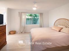 7 Wentworth Loop Dunsborough WA 6281 $795,000 This light filled, stylish family friendly home has been carefully designed and placed on a large 596sqm lot to take advantage of the warmth of the winter sun throughout the living, dining and alfresco rooms and areas. Featuring high 31 course ceilings in these rooms, the spacious well-appointed kitchen features 900mm appliances, stone benchtops, a dishwasher and a massive island bench which has many cupboards and drawers and also doubles as a breakfast bar. The main bedroom is more than generous in size, has a walk-in robe and a large en-suite with a stone top vanity, shower and separate WC. The three minor bedrooms are all oversized, include built-in robes and provide ample room for any size bed with space for other furnishings such as a chest of drawers, desk etc. An activity-come-study area is located between these bedrooms which are serviced by a bathroom with shower, a large bath and vanity and a separate WC. All 4 bedrooms have ceiling fans. At the front of the home is a private home theatre / second living area. The double garage has direct access into the 2 metre wide hallway and gives you plenty of room for cars or extra storage space. This is a sought after location and the property is amongst homes of quality and within an easy walk to the white sands and turquoise waters of Quindalup Beach and Geographe Bay.