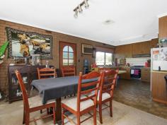 3 Dickson Court Chiltern VIC 3683 Comprising of five (5) bedrooms, all with built in robes. An open kitchen/meals area with large lounge room. The kitchen is highlighted by abundance of cupboards, plenty of bench space and gas cooking. A full family bathroom with separate toilet and large well-appointed laundry with a second separate toilet complete the internal floorplan. Outside consists of low maintenance surrounds, spacious lawn areas and rear access via double gates to a double carport with storage room or workshop. Other features include: - Ducted heating. - Evaporative cooling. - Slow combustion wood heating. - Great storage throughout.