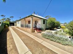 5 Railway St Koorda WA 6475 This beautifully presented 1930’s home is complete with 3-bedrooms 1-bathrooms, 2-bay lockable garage, weatherboard construction and iron roof, carpet & bamboo flooring with tile in the bathroom, laundry and toilet. The home boasts an enclosed carpeted entry room - a large lounge room with carpet, high ceilings throughout, a fire place and reverse cycle air conditioner - dining room with bamboo flooring and raked ceilings which flows into the kitchen allows access to the patio via glass sliding doors. The kitchen comprises of bamboo flooring, gas stove cook top and electric oven. The master bedroom features wardrobes, fan and a reverse cycle air conditioner. Bedroom 2 and 3 both have carpet, with bedroom 3 having access to the patio. The property features a generous sized undercover patio - fully enclosed, and allowing access to the external wet areas (laundry, toilet and bathroom). There's a large lawned backyard and a separate fenced off area at the rear of the property making a perfect place for your chooks to roam. You will also find 2x water tanks (5,000L & 15,000L), solar HWS, lovely established gardens, workshop, storage shed all enclosed around the perimeter with colourbond fencing. The property comes fully furnished including white goods - perfect for the investor!