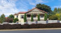 14 E Parade Deloraine TAS 7304 $980,000 This magnificent four bedroom, highly sought-after, Circa 1920, Californian Bungalow style home, retains the vast majority of its impressive architectural features. Set facing the picturesque Meander River, you will have breathtaking views daily. The grand façade is just the beginning… Features Include: - Spacious main bedroom with walk in wardrobe and ensuite - 3 additional bedrooms, 2 with built ins - Polished floorboards in main living spaces - Renovated spacious main bathroom, including deep set bath and European laundry - Light filled open plan kitchen and dining - Formal lounge with stunning box bay window, which includes ornate lead light surrounds and timber fretwork - 10 foot ceilings - Spacious hallway with ornate timber fretwork - Central gas ducted floor heating together with a period reproduction inbuilt wood heater in the lounge room - Underneath rumpus room, suitable for teenage retreat - Large front veranda with river views - 3 bay garage - Fully completed and stunning landscaping to front and rear yards - Established fruit trees - Undercover alfresco patio at the rear with built in pizza oven - Land size of approx 1600m2 Close to both primary and high schools, local cafes, supermarket, doctors, and pharmacies.