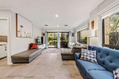 2/11 Prevost Place Macgregor ACT 2615 Nestled at the end of a quiet cul-de-sac in peaceful Macgregor is this modern and very comfortable 3 bedroom townhouse. Backing parkland, this is a rare opportunity to secure a stylish near-new home in an established suburb with all the creature comforts. The interior features a formal entryway leading through to a large open plan kitchen with walk-in pantry, dining and living room which flows out to a fabulous rear deck. The family chef will love cooking up a storm in the stunning kitchen, complete with stone benchtops, pendant lighting, and quality stainless steel appliances. Positioned on the lower level you'll also find the laundry and separate powder room. Ascending upstairs, three light and lovely bedrooms await. However, before you see the bedrooms, you are met by a spacious study. Perfect for working from home or a homework corner. All bedrooms benefit from generous sizing, built in robes and plenty of natural light. The master features its own walk-in robe & ensuite, plus great views over the park. The main bathroom, also upstairs, features a shower & bath, and a separate toilet. Also featuring a lovely outlook of the park is the elevated rear deck off the downstairs living room, which is fully covered for family meals and entertaining. Ducted reverse cycle heating and cooling, instantaneous gas hot water, and a double lock up garage with internal access add to the perks of this lovely home. The popular Magpies Belconnen Golf Club is a short drive up the road, while Kippax Centre and all its amenities are less than a 10-minute walk away. There is easy access to major arterial roads which will take you into the heart of Belconnen and the city. Features: Quiet street backing parkland Only 2 townhouses and a single house on the 1409m2 property, self-managed (low body corporate) Absolutely stunning 6-star energy efficiency rating Elevated timber patio Open plan kitchen, dining and living room Kitchen with gas cooking, stone benchtops, new dishwasher, microwave, island bench Walk in pantry Downstairs powder room Study nook on the upper level Main bedroom with walk in robe, ensuite and park views 2 additional bedrooms with built in robes Stylish main bathroom with separate toilet Laundry with good storage Ducted reverse cycle heating and cooling Fabulous elevated and covered rear deck Fully fenced rear courtyard with grassed area Double lock up garage with internal access Under stair storage NBN connected Easy access to Kippax shopping centre Close to Belconnen (9 minute drive) Less than 20 minutes to the city Walking distance to Macgregor Primary School and Kingsford Smith School
