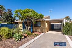 9C John St Midland WA 6056 This 2-bedroom, 1-bathroom property occupies a remarkable 409 sqm lot at the rear of a small unit complex. An open-plan kitchen/meals extends onto a large alfresco entertaining area edged with lawn and a screen of established trees. A rare find in a central location with the atmosphere of a small home, this unit is not to be missed. 2 bedrooms 1 bathroom 1979-built brick and tile Rear small unit complex Open plan kitchen/meals Fully tiled reno’ed bath Big gabled alfresco living Gated two-car carport Reticulated lawn & garden Surprising 409 sqm block Close schools shops transp Boasting the backyard of a small home with a large outdoor entertaining area, lawn, and reticulated gardens, this unit nestles at the rear of a 5-unit complex. Surrounded by greenery, the home features a single carport with gated access to the backyard and a welcoming portico entry. A north-facing window, fresh white walls and rich timber-look laminate floors offer a bright welcome as you step inside the family room. This palette of colours and materials continues in the adjoining kitchen/meals area, creating a visual flow and a sense of cohesion. The kitchen is well-appointed with ample under bench and overhead storage, a U-shaped benchtop with an integrated breakfast bar and a freestanding oven. There is ample space in the meals area for a full-sized table, but this property is designed to encourage alfresco dining. A sliding door opens the kitchen/meals area to a big, beautiful patio sheltered by a high gabled roof. Established plantings along the property’s fence line create a private, secluded space with room for entertaining and an exceptional sense of space Two good-sized bedrooms share the fully-tiled renovated bathroom. An on-trend neutral palette creates a light and airy space with a delightfully modern vibe. Set in a great central location, close to public transport, the Midland Health Campus and Midland Gate shopping centre. St Brigid’s Primary School and the North Metropolitan TAFE are within walking distance of this unit with more.