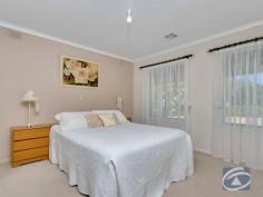 74 Calton Road Gawler East SA 5118 $499,000 - $529,000 Welcome to 74 Calton Road, Gawler East. This beautifully updated home is set back on an expansive 748sqm allotment (approx) and is surrounded by established gardens and other well cared for properties. Residing within walking distance to schools, Gawler’s Main Street, parks and shopping centers this property is the pinnacle of convenience which could create a wonderful lifestyle for any savvy buyer. With its flexible floorplan, feel free to take advantage of a four to five bedroom home, with three separate living areas, updated bathrooms and kitchen, ducted heating and cooling as well as the advantage of drive through access into a rear shed. The property includes; * Large front lounge with fresh floor coverings outlooking the magnificent front garden with roller shutters * The master bedroom includes a walk-in robe and ensuite with floor to ceiling tiling and roller shutters to its front windows * The kitchen with stone look bench tops has plenty of cupboard and bench space with stainless steel appliances * To the other end of the home, three bedrooms surround a private living area and the updated main bathroom. Bedrooms 3 and 4 include built in robes. * The rumpus room is a great entertainment space perfect for year-round entertainment * You have the flexibility of taking advantage of bedroom 5 which can easily be used as a study, business room (STCC) or be converted back to its original garage. * Outside take advantage of the large shed with concrete floor which helps service the manicured gardens - the perfect finish to this wonderful home.
