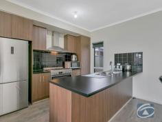 2 Willet Close Evanston South SA 5116 Welcome to 2 Willet Close, Evanston South. Set back on a convenient 375sqm allotment approximately, this 2018 built designer home is the perfect opportunity to secure your very own home in the heart of the beautiful Aspire Estate located within walking distance to Trinity College, local parks and within minutes of the main street of Gawler. Large open planned living spaces, spacious bedrooms and two well designed wet rooms, this property is the pinnacle of convenience with the added plus of its low maintenance yard and a great choice of interior selections. The home includes: - Large master bedroom with automatic roller shutters, spacious ensuite and walk-in robe - Front lounge room off the entrance hallway is the perfect secluded area to escape of an evening - The open planned kitchen, meals and living area is large and is flooded with natural light from the surrounding windows - The kitchen with breakfast bar, stainless steel appliances and dark wood additions includes plenty of cupboard and bench space - The remaining bedrooms all include built-in robes and are conveniently located around the home - A three-way main bathroom with the convince of separate toilet also includes a spa bath – the perfect addition to the perfect home - Outside, the low maintenance yard with artificial turf really does complete this great family home
