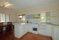 126 Kariboe Street Biloela QLD 4715 $210,000 Cottage style charm and the sheer convenience of being close to the CBD. Combined dining and kitchen equipped with breakfast bar and ample storage. A separate, air-conditioned living room with double-door access to the undercover, front patio. Polished timber floors throughout the home. 3 good sized bedrooms. Two of which have air-conditioning and built-in robes. All have ceiling fans. Step outside into the spacious undercover entertainment area. From here there's an uninterrupted view of the fully fenced back yard. There's the potential for a granny-flat or 4th bedroom adjoining the entertainment area. There's also a second shower and toilet which is especially practical when entertaining guests. Solar panel installation, a large capacity rainwater tank and drive-through access from the single vehicle carport to the fully fenced back yard.