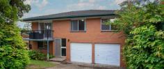 388 Mount Gravatt Capalaba Rd Wishart QLD 4122 With 3 bedrooms and living areas upstairs, and heaps of room downstairs for storage or utility rooms, this house is ideally placed to become a home. Huge 698spm block with lots of potential. Situated minutes from Westfield Garden City and Carindale, all of your shopping needs will be satisfied. Features include: * 3 large bedrooms with built in wardrobes * Large kitchen with electric appliances and adjoining dining area. * Lounge with patio at the front * Downstairs are 3 good sized utility rooms for home office or storage * 2 car lockup garage * Large backyard with room for extension. Location Features: * Minutes to Westfield Garden City and Carindale shopping centres * Easy access to Gateway Motorway and SouthEast Freeway for your daily commute * City buses at front door * Catchment for Wishart Primary and Mansfireld State High Schools * Griffith Nathan and Mt Gravatt just a few minutes away