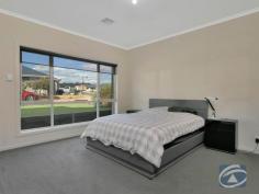 2 Willet Close Evanston South SA 5116 Welcome to 2 Willet Close, Evanston South. Set back on a convenient 375sqm allotment approximately, this 2018 built designer home is the perfect opportunity to secure your very own home in the heart of the beautiful Aspire Estate located within walking distance to Trinity College, local parks and within minutes of the main street of Gawler. Large open planned living spaces, spacious bedrooms and two well designed wet rooms, this property is the pinnacle of convenience with the added plus of its low maintenance yard and a great choice of interior selections. The home includes: - Large master bedroom with automatic roller shutters, spacious ensuite and walk-in robe - Front lounge room off the entrance hallway is the perfect secluded area to escape of an evening - The open planned kitchen, meals and living area is large and is flooded with natural light from the surrounding windows - The kitchen with breakfast bar, stainless steel appliances and dark wood additions includes plenty of cupboard and bench space - The remaining bedrooms all include built-in robes and are conveniently located around the home - A three-way main bathroom with the convince of separate toilet also includes a spa bath – the perfect addition to the perfect home - Outside, the low maintenance yard with artificial turf really does complete this great family home