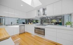 15 Roto Pl Port Macquarie NSW 2444 A RARE GEM, set in a serene, un-spoilt, private end of cul-de-sac setting, sat on 820 sqm of seclusion, yet close to everything. Surrounded by nature and approx 2km to the CBD and 1.5km to Flynn’s Beach, with schools within easy access, this outstanding home has plenty of choice for an Executive Entertainer or All Round Family Home. This splendid modern home boasts detailed finishes, beautiful natural gardens and a great layout offering the best of relaxed family living to seamless indoor and outdoor entertainment. This 4 Bedroom home has a master with twin showers ensuite and walk-in robe, 3 versatile guest bedrooms with built-in robes and a spotless floor to ceiling tiled bathroom with a luxury bathtub. With light streaming into the well-appointed gourmet open plan kitchen, elegant glass splash-back and quality appliances, this kitchen delivers for Foodies and Families alike. The spacious living / dining area, opens seamlessly to a large undercover entertaining area with built in bbq and bar, drawing in a view of the outdoor greenery casting shadows over the large family sized heated pool area. Lets take a look at the Highlights !! • Modern 4 Bedroom, 2 Bathroom, 2 Car Garage and room for your Caravan and Boat • Close to the CBD and Beaches of Port Macquarie • 820 sqm of land in a secluded location, but near the heart of town • End of Cul-de-sac location • Fully appointed spacious kitchen area • Office Space to work from home or study • Open Plan living, bringing the outside in • Large Built in BBQ / Bar on the undercover outdoor entertaining area • Family sized heated saltwater pool with plenty of space to sunbath • Solar Heating • Level established North facing rear garden