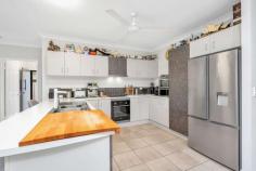 4 Whela Close BENTLEY PARK QLD 4869 $459,000 Therese Plath says "you will be impressed and delighted once you have inspected this stylish family home". Enjoy quality lifestyle living indoors or outdoors and so close to a choice of schools, shopping and retail areas, parks and mountains which dance around you. A short 20 minute drive will take you to the hustle and bustle of Cairns City Centre. This established home is enhanced by low maintenance gardens and positioned in a quiet, family friendly close. The family and dining areas are overlooked by a stylish streamlined kitchen complete with plenty of bench and cupboard spaces, breakfast bar, stainless steel appliance and a large pantry. Direct access out to a magnificent rear under cover and tiled alfresco entertaining area - perfect for large gatherings with family and friends. All four bedrooms are generously sized with master bedroom complete with walk-in robe and en-suite. The family sized bathroom has plunge bath, shower and separate toilet. Additional features include: security screens double remote garage with internal access separate laundry Solar power Safely fenced to rear Side access - room for small boat or trailer