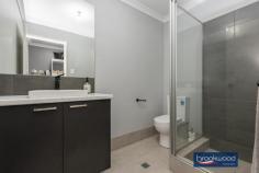 186 Dalmilling Dr The Vines WA 6069 $349,000 Elevated behind a white picket fence and a nature strip that broadens out to merge with a neighbouring park, this 3-bedroom 2-bathroom home is a picture of perfection. The 2020-built brick and iron residence uses an open plan living zone flowing into a sunny, north-facing courtyard to deliver seamless indoor-outdoor living. Nearby parks, walkways, and the Swan Valley’s gourmet delights offer an enviable lifestyle at home and away. 3 bedrooms 2 bathrooms 2020-built brick and iron Indoor-outdoor floorplan OP kitchen living meals Modern colour scheme Central courtyard garden Dble auto enclosed carport Reticulation front & rear 225 sqm “cottage” block Blue ribbon first home A limited palette of colours and materials, a floorplan where shared and private spaces are well defined and a central outdoor living zone fashion a home designed for contemporary living with a sense of welcome and ease. Three bedrooms sit at the front of the floorplan. Two juniors with plush carpet and a wardrobe recess are arranged on either side of a shared family bathroom featuring black tapware and an on-trend colour scheme. The principal bedroom features a pair of tall windows looking across the front garden and paved patio. Completing this oasis of calm is a walk-through robe opening into an ensuite with a shower, vanity, and WC. At the rear of the plan, an expanse of open living merges with a paved courtyard to expand the functional living space. Light-hued timber-look floors and an uber-cool palette of white and charcoal give this central living zone a modern edge. An island bench with an integrated breakfast bar, stone-topped benches and a 900 mm oven with a 5-burner hob will delight the most passionate of cooks. Reverse cycle air-conditioning delivers year-round climate control to the central living zone. The north-facing courtyard is open to the remote entry, 2-car auto enclosed carport. The extra-height carport has clearance for a 4 X 4 and is accessed via a rear laneway. Move-in ready, beautifully presented and a picture-perfect first home, this easy-care, easy-living property is not to be missed.