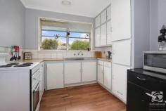 54 Hereford Street Wodonga VIC 3690 $389,000 Located in central Wodonga, this solid brick and tile home would be the perfect addition to any astute investor's property portfolio. The current rental appraisal allows for a return of 4.7-4.8%, with the opportunity to increase your return as updates are carried out. Built circa 1970, the home features original wood flooring throughout, exposing the quality craftsmanship of the build. The three bedrooms are a generous size, with the master having built-in robes installed. The "Jack & Jill" style bathroom has an entrance from the hall but is also accessible from the toilet/laundry. The large original kitchen is functional and lends you the opportunity to maximise your investment return if you were to update and incorporate the sizable dining area. Outside, you will find a huge paved, covered, and enclosed alfresco, creating another fantastic living area for the family. Such a versatile space lends itself well to the addition of a pool table and big screen TV and you have created the much-desired man cave, or for the romantic at heart, the addition of a spa and lounge would create your own private oasis. Double gate access to the backyard allows for storage of trailers, the addition of storage/shedding or a secure pet paradise. Being quite central, the property is close to primary and secondary schools, shopping, the hospital, parks and walking trails. Perfect for families with children or pets!