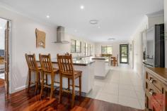 1 Highfield Way Branxton NSW 2335 $1,400,000 - 1,500,000 Nestled on an 8034sqm block sits this exquisite home in the ever-popular suburb of Branxton. Being only a short 20-minute drive to Maitland or Singleton and under an hour to Newcastle, you are tucked away in a peaceful location while close to significant suburbs. Branxton sits in the heart of the wineries and restaurants of the Hunter Valley. Designed to impress the fussiest of buyers, with loads of natural lighting, LED lights, striking timber floors, high ceilings, and a wrap around verandah, what else could you want? A spacious open plan main living room, kitchen and dining area combine to create a well-functioning communal living space for the whole family to enjoy. The heavy traffic areas are designed with a combination of lovely timber floorboards and tiles to provide good looks and practicality. Multiple living areas are on offer, allowing room for the growing family Modern gourmet kitchen, fitted with stone benchtops, ample storage, downlights, extra large pantry and an island bench. All four bedrooms are well appointed and feature an oversized master suite that includes a great size walk in wardrobe and full sized ensuite, shower and bath; and is perfectly positioned within the home, making it ideal for anyone doing shift work!. Additional bedrooms come with built in robes. Outside there is PLENTY of playroom for the kids and pets. Whether it be a cricket match or kicking the footy around, there is ample grass to play on with storage for a ride on mower and your garden tools. A separate spacious studio is an excellent addition for extended family and friends or ideal for the kids if they want their own space. The options are endless. Additional features: Multiple split systems and the option for ducted air conditioning for that all-around comfort; two large sheds 9.5 x 15m, and an additional 18 x 7.5m, giving you ample storage space and plenty of room to park the trailer, car or boat, 7.5 KW Solar System, swim spa and laundry with internal access