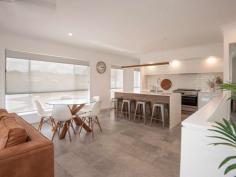 24 Earls Court Goonellabah NSW 2480 $995,000 - $1,045,000 With a commanding street presence, the scale of this home is evident from the moment you arrive. Designed with the large family in mind, the functional layout, quality of construction and the level of finishes will leave you wanting for nothing. Boasting four large bedrooms - the main with his and hers walk in robes, generous ensuite and a stunning outlook, the other bedrooms have built in robes and the home has extra high ceilings throughout giving a real feeling of space. The heart of the home is the open plan, air conditioned, kitchen, dining and lounge area, seamlessly flowing from the kitchen, right through to the front balcony - large enough for a dinner party and taking full advantage of the leafy outlook. The kitchen is stunning with stone tops, island bench and a beautiful pendant light while the chef will love the 900mm freestanding oven and gas cooktop. Storage is a breeze with a large butlers pantry along with appliance bench. The rumpus room to the rear of the home opens directly out onto the covered entertaining area with steps leading to the large flat rear yard, the ideal place for a game of soccer or cricket, space for a trampoline or even a pool. Fully fenced and ideal for pets, there is simply nothing to do. Avoid the delays and uncertainty of building costs - your opportunity to skip the que is right here..