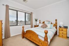 Unit 2/138 Lewington St Rockingham WA 6168 $569,000 Set in a quiet street and opposite a nature reserve, this stylish 4 bedroom (or 3 bedroom plus study) double-storey townhouse is also just two blocks from the Naval Memorial Park and some of the gorgeous beaches the city has to offer. With features galore including a tranquil outdoor wooden thatched gazebo with timber decking and weather blinds, this townhouse will exceed your expectations. Enter the home through double doors and be impressed by the porcelain tiling and high ceilings of the foyer which flows through to the main living area and kitchen. To the right of the entry is the 4th bedroom fitted with a built-in robe that could be utilised as a study. Head upstairs where you'll find the master bedroom with ensuite and walk-in robe, plus the two minor bedrooms, family bathroom, retreat and balcony. Outside, you will enjoy relaxing or entertaining under the large patio/gazebo which can be used all year round. Plus the handyman will love the outside storeroom which has been fitted with a workbench. Additional features include: - High ceilings throughout - Granite benchtops in kitchen - Ducted reverse cycle air conditioning - Downstairs laundry and powder room - French doors - Outdoor storage room - No strata fees - Common driveway
