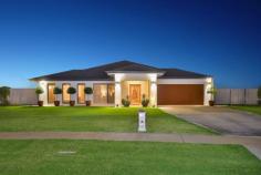 16 Henrys Run Drive Mildura VIC 3500 $899,000 - $988,000 Principal & Elite Sales Agent at Ray White Mildura Damian Portaro is proud to present for sale all the style and elegance of a brand-new home with this 2020-built abode by Lockstar Homes. Soaring 9-foot ceilings flow overhead, paired with an abundance of natural light and a family-friendly floorplan. The three guest bedrooms are tucked away in their own wing alongside the main bathroom, while the owner's suite enjoys unparalleled privacy at the front of the home. A walk-in robe and a spa-inspired ensuite with a soaking tub make this a true retreat. The heart of this home is the kitchen with stone benchtops, a server's pantry and a 900mm free-standing oven as well as views over the family and dining area. A separate lounge adds flexibility and there is also an office for those who work from home. Ceiling fans and reverse cycle heating and cooling promise year-round climate control and there is also a powder room for guests and an abundance of storage throughout. Sliding doors invite you to step out to the beautiful alfresco with a timber-lined ceiling, recessed lighting and a ceiling fan to ensure complete comfort. You can relax with friends as you fire up the BBQ or step down to the fire pit area and roast marshmallows as the sun sets on another day in paradise. Expanses of lush lawn welcome the green thumb with big plans for veggie patches and chickens or you can simply relish the space and privacy on offer thanks to the 2,001sqm block. For the DIY enthusiast, there is a large approx. 11x6m shed while the long list of extra features includes a two-car garage, an automatic sprinkler system and side access with a second crossover for access.