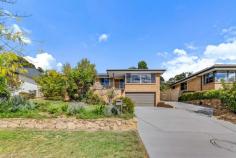 20 Prescott Street Farrer ACT 2607 Perched on an elevated block is this lovely family home. We are sure you will enjoy all this property and position has to offer, for many years to come. Boasting comfortable living areas and cosy bedrooms, with the north facing windows capturing leafy tree top views into the mountains. This layout is spacious and has been designed to suit modern living. Complete with contemporary kitchen, formal lounge, formal dining, casual family and meals area, four bedrooms, two bathrooms and a european style laundry. The home has been meticulously maintained over the years and recently had fresh paintwork both internally and externally. Offering a home that you can move into and enjoy, with still room to add your personal touch. In the garden you will find established trees and bushes, beautiful lawn and blooming flowers. Private outdoor sitting area is off the meals room and is a great place to entertain or watch the kids in the garden. Complete with garden shed and double car garage, we are sure this home will appeal to a range of families looking for the home that will suit them for now and into the future. Positioned within a pleasant walk from Farrer Shops, Farrer Primary, lovely parks, local oval and everything your family will need. Farrer is a convenient and much loved suburb by many Canberra families. Woden Town Centre, Mawson Shops, Melrose High and Marist College are also within a short drive / ride from home. Set on a generous and elevated block, in a quiet street Offering a functional and spacious floorplan Filled with an abundance of natural light Formal lounge and dining rooms capture north facing mountain views Kitchen is positioned at the rear of the home overlooking the garden Including gas cooktop, electric oven and Smeg dishwasher Comfortable family and meals room off the kitchen All four bedrooms are a nice size with built-in robes Master bedroom is generous and includes renovated ensuite Main bathroom with bathtub and custom vanity Ducted gas heating throughout the home and ready to install cooling Paved outdoor sitting area, lovely lawn and establish garden Double garage on the lower level Additional storage space under the house 6 solar panels installed Great location and a much loved position sure to be missed Farrer Primary, Melrose High and Marist College all nearby Local shops, oval and parks within walking distance