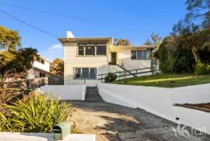 40 Walch Avenue MOONAH TAS 7009 $670,000 Superb Derwent River Views! . Elevated position with superb river views . Fabulous private block backing onto reserve . Relax and enjoy a quiet cul de sac locale . Generous main bedroom has b.i. robes & ensuite . Timber & glass doors lead to paved courtyard . Spacious rumpus room or 4th bedroom under . Warmed by elec heating inc. Daikin heat pump . Easy care grounds and a fully fenced rear yard . Moonah shopping precinct only 1 km away . Schools, doctors, bus service & shops all close by . Just a 10 minute drive to Hobart CBD & Salamanca . Be quick to secure a fabulous lifestyle package