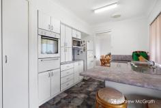 29 Caldwell St Caves Beach NSW 2281 $1,150,000 Is this your dream beach house? Well probably! Located just a few hundred metres from picturesque Black Neds Bay, and just down the road from from one of the most beautiful stretches of coastline that NSW has to offer at pristine Caves Beach, this home is a timeless classic, just waiting for you to make her your own. Immaculately presented, single level three bedroom brick home with a floor plan that will suit busy family life and those that love to entertain. All the bedrooms are clustered at the right side of the house, leaving the left side of the home for living and entertaining. The main bedroom is huge and features a stunning bay window, built in robe and a ceiling fan. The other two bedrooms are a great size and one has a built-in robe. All the bedrooms are close to the main bathroom that features a separate bath and shower and of course the all important separate toilet. The modern kitchen with breakfast bar overlooks the yard and is perfectly positioned between the formal dining space and the informal meals area. Renovators will see the endless possibilities here! We’re seeing stacker doors opening to a beautiful alfresco area where you will be able to enjoy the coastal seabreeze. In colder months there’s plenty of room for an outdoor fire pit to keep the party going all year round, or to ensure that your home the place for your teenager’s friends to meet. The living and dining space is air conditioned, but also benefits from the gorgeous coastal cross breezes all through summer. It opens onto the front porch via the most delightful french doors. Add some gorgeous cane chairs and enjoy your quiet coastal neighbourhood. Maybe the kids can even set up a cricket pitch on the front lawn to host the Caves Beach Classic for the Caldwell Street kids! This is a place that has that sort of atmosphere. There is an internal access laundry that leads directly to the yard. The attached single carport is ideal for easy access to the home and there's side access for boats, cars and vans to get to the big colorbond garage. Large level fenced yard - perfect for kids. Located close to schools, shops, beach and Black Neds Bay and its even a level walk to Swansea Shops! Although there's plenty of ways that a savvy renovator could put their stamp on this home, it is also ideal for anyone just looking for a very special coastal retreat because there's not a cent to spend unless you want to.