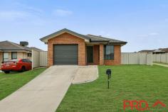 9a Brushbox Grove Tamworth NSW 2340 This is your opportunity to acquire a well-maintained, easy care home with tenants already in place. Offering four bedrooms with built in wardrobes and ensuite to the main, well-appointed kitchen with separate lounge and dining areas and a single lock-up garage with internal access for your convenience. Features include, gas point for heating, ceiling fans and evaporate cooling for the warmer months. Easy to maintain yard with an undercover alfresco for entertaining. Located in Oxley Vale close to Northgate shopping centre, schools and hospitals.