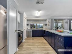 13 Ottaway St Kelmscott WA 6111 $300,000s Welcome to 13 Ottaway Street, Kelmscott. Where do i start? I have sold numerous properties for the current owners and every property has been totally renovated to the highest quality. This one is no different and is top of my list! In a short period of time the owners have transformed this now stunning 3×2 plus study property into the magnificent property you see today. THE PICTURES DO NOT LIE. Sitting on a good size 438sqm strata titled block ( NO STRATA FEES ), this property will suit first homebuyers, investors, couples and downsizers, due to its close proximity to transport, schools, shops, coffee shops and medical services. NO NEED FOR THE CAR! Selling features of this stunning property include: Fabulous front facade with new picturesque gardens – Double garage one side remote control operated the other manual – Revamped driveway – Separate entry – TV / lounge room – Good size master bedroom with Walk in robe and tastefully renovated ensuite adjoining the nursery / study / 4th bedroom – simply jaw dropping open plan kitchen /dining / meals area which is the hub of the home – The kitchen has been totally refurbished, with plenty of bench space an abundance of soft closing cupboards, a feature gas hob setting, Westinghouse electric oven, Westinghouse dishwasher and direct shoppers entry – The family room is big enough to have the largest sofa and dining setting – Two good size guest bedrooms with built in robes, serviced by the second renovated bathroom with shower and separate bath for the little ones – The laundry and second WC is located at the rear – Simply amazing transformed backyard, with new gabled patio to entertain, colour everywhere, garden beds galore, water feature, garden shed new high fence for privacy, plus much more. Other selling features include ; Fresh paint throughout – New vinyl flooring throughout the living areas and thoroughfares – Industrial grade vinyl to the 2 guest bedrooms – Ducted evaporative and split system air-conditioning – Roller shutters on the front 3 windows – Crimsafe security screens around the back and side of the property – 6.1kw solar system, 14 panels – New window treatments and blinds – 2 x gas bayonet heating – Gas instantaneous hot water – Gas cooking – Ceiling fans – Reticulation front & back plus more.