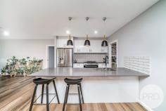 69 Connorton Street Uranquinty NSW 2652 $749,000 An extremely rare opportunity to get a near new home with every inclusion you can think of and finished to the highest standard. Set on a great sized 878m2 block and less than 2 years old, there are three large bedrooms all with built in wardrobes and a master with stunning ensuite and oversized walk in robe. There is also a full sized study room with built in cabinetry and multiple indoor and outdoor living areas. The kitchen is state of the art with soft close drawers, a walk in pantry, stone benchtops and an abundance of storage options. Outside there is an undercover entertainment area with built in kitchen and drive through access from the double garage to a huge powered shed. There's also a quaint kids corner to play away the days! This home will appeal to those wanting a new home of 'show home' quality, in a family friendly area that you can move straight in to without a cent more to spend.