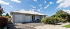 28 Mecca Ln Bungendore NSW 2621 $1,320,000 This home is carefully designed, and this has resulted in a unique architectural home. The front landscaping and construction design has produced a sleek no fuss set of lines. This simple façade design has elements of colonial and contemporary styles, and it works. The colour scheme is soft and neutral from the walls to window frames and then throughout the homes flooring and tile choices. The entrance hall is spacious and has direct access to the home office, master suite and DLUG. There is a custom commercial grade front door which gives a sense of quality and contemporary styling. The front door, hardwood decking and steel construction throughout the home offers industrial quality. The living area is spacious and light, the sheer size of the main living area will blow you away. The main living areas are combined in open plan, however within this open plan there are specific areas that identify a use. There is a formal lounge dining area that has carpet and offers a comfortable space to entertain your family and friends. A large combustion wood fire warms the areas over colder months and A/C split systems also add convenience throughout the year. There is a separate rumpus or sunroom for the pool table or ping pong. This is an amazing room for the kids to get away or a hobby room. If you are looking for a big kitchen with plenty of storage, then this kitchen will impress you. The kitchen is open plan to the family room and flows out to the alfresco through sliding doors. There is a double Fisher and Paykel oven, a 900mm stainless steel gas cook top, this kitchen is ready for the home chef. The large benchtops with 5 seater breaky bar allows for plenty of space to sit and enjoy a chat at the end of the day while the meals are prepared. The kitchen is the hub of the home and everything leads from here. It functions so well due to the design and sheer size. The home was built around the kitchen. 28 Mecca Lane is a property full of surprises, each of the 4 bedrooms are a really good size and the home office will also impress. The office is a great space and positioned in a quiet part of the home. With minimal effort the home office could be transformed into a great dressing room directly off the master or become a 5th bedroom for your guests. The master bedroom will comfortably fit a king size bed and has lovely big wardrobes. The room is positioned privately to the front of the home giving the parents their own space to enjoy. The remaining 3 bedrooms are a decent size and provide plenty of space for queen beds and a desk. All bedrooms have built in robes and lovely high ceilings. There are plenty of sort after features at 28 Mecca Lane e.g. the enormous open plan kitchen and living areas to the generous back yard. It is also has solar panels that provide continuous solar hot water. All this, and the property also have no neighbours to the rear and benefits from views over farmland to Gibraltar Mt.