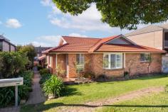 2/7 Stuart Street Helensburgh NSW 2508 This single level home offers everything a first buyer, downsizer or young family needs. The 2 bedroom villa offers an easy and carefree lifestyle while being perfectly positioned near cafes, supermarkets, restaurants, shops, pubs and so much more, how could you pass up this opportunity? YOUR HOME • Features a private paved courtyard that is fully fenced. • Both bedrooms feature built-in wardrobes. • Bathroom with both a shower & bath. • Lock up garage • Tucked away in a small block of four • This neatly presented villa is the perfect option for downsizers, first home buyers or anyone wanting an easy and carefree lifestyle. YOUR LIFESTYLE • Centrally located to shops, cafes, transport, parklands and swimming pool. • Picturesque Stanwell Park Beach is less than 10 minutes drive. Enjoy Coastal living without the huge price tag. • This is one of the only remaining areas where you can find a peaceful regional lifestyle less than an hour from Sydney. It offers all of those charming lifestyle benefits that one would associate with small town living:- bushwalking, swimming holes, bike tracks, sporting clubs, cafes and of course plenty of friendly people. • Helensburgh is also an ideal location for commuters with express trains to Sydney and Wollongong as well as direct access to the Highway. Sydney is approximately 60 minutes while Wollongong is 30 minutes. Helensburgh is becoming an increasingly popular suburb so there is no better time than today to secure your own little haven in this family friendly area. Only 45 minutes South of Sydney and 30 minutes North of Wollongong.