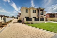 Unit 2/138 Lewington St Rockingham WA 6168 $569,000 Set in a quiet street and opposite a nature reserve, this stylish 4 bedroom (or 3 bedroom plus study) double-storey townhouse is also just two blocks from the Naval Memorial Park and some of the gorgeous beaches the city has to offer. With features galore including a tranquil outdoor wooden thatched gazebo with timber decking and weather blinds, this townhouse will exceed your expectations. Enter the home through double doors and be impressed by the porcelain tiling and high ceilings of the foyer which flows through to the main living area and kitchen. To the right of the entry is the 4th bedroom fitted with a built-in robe that could be utilised as a study. Head upstairs where you'll find the master bedroom with ensuite and walk-in robe, plus the two minor bedrooms, family bathroom, retreat and balcony. Outside, you will enjoy relaxing or entertaining under the large patio/gazebo which can be used all year round. Plus the handyman will love the outside storeroom which has been fitted with a workbench. Additional features include: - High ceilings throughout - Granite benchtops in kitchen - Ducted reverse cycle air conditioning - Downstairs laundry and powder room - French doors - Outdoor storage room - No strata fees - Common driveway