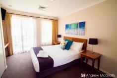 430 Currawong Cct Cams Wharf NSW 2281 $480,000 - $520,000 Located only minutes from Lake Macquarie foreshore in the private award winning Rafferty's Lakeside Resort. This terrace is fully furnished with two bedrooms each with large bathrooms and spacious deck. As you open the front door you will slip into a spacious, open plan living area where the polished timber floors connect the lounge and family sized dining area together to create a homely connection. With ducted air conditioning, laundry, sun-drenched private balcony and a modern kitchen filled with all your needed appliances. The upper level of this family sized terrace is filled with freshly cleaned carpeted floors that flow into two separate king sized bedrooms that each include built-ins, TV's, large bathrooms with spa sized baths. These two bedrooms hold access to the upstairs balcony that sits high up with the tree tops and gives you glimpses of the beautiful Lake Macquarie. Including a car space, unlimited access to three different resort style swimming pools, restaurant and tennis courts.