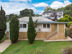 34 Ubrihien Street Lismore NSW 2480 This solid, four bedroom home is conveniently located in a flood free position within walking distance to the Lismore CBD, Shopping Square, sports fields, schools and the Base Hospital. Three bedrooms have built-in wardrobes, mulitiple living options include the formal lounge room while at the rear is a spacious family room with both being air conditioned for added comfort. The kitchen has been renovated and comes with timber benchtops, gas cooktop and dishwasher. There are polished timber floors and the high ceilings with ornate plasterwork are typical of the era. and the front entry/sunroom provides the potential to ad value with the addition of an ensuite, study or walk-in robe. The private covered verandah is a great entertaining area to gather with family and friends, the home still provides plenty of scope for you to put your own finishing touches to the inside and out. Be sure to arrange your early inspections, this location, style and pricerange is sure to attract strong enquiry.