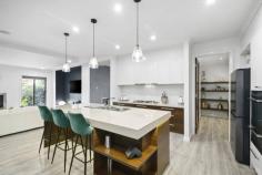 240 Saltwater Promenade Point Cook VIC 3030 $1,050,000 - $1,150,000 If you've been looking for a spacious family home with a focus on entertainment, stop your search this is the one! Boasting four great sized bedrooms the master features his and hers walk in robes and its own luxurious en-suite, while the three remaining bedrooms are all fitted with built in robes and serviced by the light and bright central bathroom. The kitchen offers an abundance of bench and cupboard space with thick stone benchtops, quality appliances and a large butlers pantry, while overlooking the spacious meals and family zone. There are two additional living zones and a theatre room also on offer so the largest of families will have plenty of space. Your working from home needs will be covered by the large study which could easily be converted to a 5th bedroom if it was needed. Outdoors you'll love the huge decked pergola for entertaining friends and family year round and the spacious yet low maintenance yard. Other great features this home has are double lock up garage, gas ducted heating, evaporative cooling, split systems, double glazed windows and much more! Located in the ever popular Saltwater Coast Estate you're only a short distance to Saltwater Coast Lifestyle Centre which includes a pool, gym and tennis court, Saltwater P-9 College, Point Cook Homestead Senior College, St Mary of the Cross Catholic Primary School, parklands and public transport. This home is sure to impress, inspections are a must!