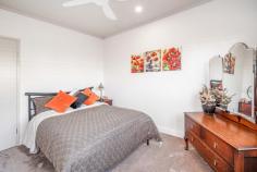 2 Cramer Street Kilgariff NT 873 $829,000 Behind the security of a tall fence and electric remote-controlled gate, this home is impressive, generously proportioned, and contemporary. The home incorporates a welcoming open plan kitchen/dining and family area with three spacious bedrooms, two of which include large walk-in robes and one a with study nook. The master bedroom is luxurious and offers an ensuite complete with twin vanity, an open shower, and floor-to-ceiling tiling. The functionality of the second bathroom is well designed with a free-standing bathtub, open shower, wall hung vanity, and toilet. The additional bedrooms located on either side of the bathroom are of great size with plenty of space to move around. The sleek and stylish kitchen consists of a freestanding cooktop and oven, a modern canopy range-hood, ample storage and preparation space, and a stainless-steel dishwasher. Designed for the modern family, the island bench divides the space and overlooks the outdoor entertaining area. The stunning mix of colour and lush green lawn is captured through the extensive use of glass. The full-length sliding doors provide easy access to the outdoors and the views of the famous Macdonnell Ranges in the distance are just magical. The convenience of split system, air-conditioning, and ceiling fans throughout this home ensures absolute comfort all year round. The 6 kW solar panels are a convenient addition to the home with the bonus of a water softening system. Features include: – 3 Bedrooms, 2 Bathrooms – Split System Air-Conditioning throughout – Eco-friendly Bio Ethanol Fuel Fireplace – Water Softener – Gas Cooking – Outdoor undercover entertaining area – Built-in Bar – Garden Sheds – Double Carport – Solar Electricity – Secure fencing with an electronic gate – Multiple dwelling option – and so much more……… This property is the complete package and will not be on the market long.