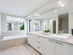 7 Jasper Avenue Hamlyn Terrace NSW 2259 $1,350,000 This incredible home oozes modern style, space and design. Located in a quiet street and surrounded by quality homes, this outstanding property is abounding with quality fixtures and features throughout and is a must to inspect. Featuring four large, open and separate living areas including home theatre that flow out onto a beautiful covered rear alfresco entertaining area with an open plan designer kitchen and butler's pantry. - Grand master suite - entry via double opening doors - feel like royalty every time you enter this supersize room leading out to own private balcony to sit and enjoy the amazing sunrise, large en-suite to relax, enjoy and unwind in luxury bath. - Four spacious bedrooms are all equipped with built in wardrobes. - 2 full bathrooms including the huge en-suite to the master and 3 toilets with downstairs powder room. - Incredible kitchen complete with 40mm stone benchtops, butlers pantry and 90cm oven plus gas cooktop. - Oversized double lockup garage plus off street parking. - Separate upstairs and downstairs study areas to accommodate 4 workstation zones. - Seamless flow from designer interiors to outdoor entertaining. - Facing East capturing beautiful sun and sea breezes. - Large, private and fully fenced back yard with ample room for in-ground swimming pool. - Ducted air conditioning throughout for year round comfort. - State of the art security system in place. Your whole family will love being conveniently located to all amenities including shops, trains, schools, M1 Motorway, Tuggerah Lakes, beaches, hospital, medical centre, nearby sporting facilities and only 1 hour from both Sydney and Newcastle. Come, sit back and enjoy life in this immaculate masterpiece. Truly one of Hamlyn Terrace's finest family homes.