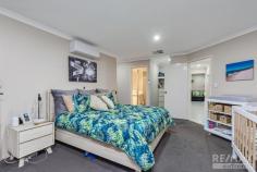 17 Landbeach Blvd Butler WA 6036 This super spacious family home stands proud in a central Brighton location with only a small walk to the lakes, shops and train station and offers space and serenity in abundance! The owners have spared no expense in making this a top of the range home… the extras are endless and they includes SIDE ACCESS FOR A BOAT OR CARAVAN, SOLAR POWER PANELS, ROLLER SHUTTERS, FRESH NEUTRAL DECOR AND AN AMAZING OUTDOOR ENTERTAINING AREA…!!! With huge street appeal, this impressive home has been designed & constructed to meet the needs of the growing family! If you’re looking for a property that you won’t outgrow in a hurry and love the great outdoors, then look no further…!!! Offering plenty of street appeal this imposing home is proudly perched on a huge 608m block looking out to beautifully manicured gardens and the front entry provides the perfect welcome home! The spacious master bedroom is nicely secluded at the front of the home and boasts his & hers walk in robes, roller shutters and the renovated ensuite features glass shower screens and upgraded tapwear and tiling. Rarely will you find a home that offers three additional queen sized bedrooms so prepare to be impressed! The kid’s bedrooms all have larger walk in robes and are well presented. Central to the home amongst all the action is the well-appointed chefs kitchen with upgraded cooking appliances, overhead storage, double fridge recess, plenty of bench and cupboard space, glass splash-backs and a shoppers entry! The extensive open plan living & dining is the ultimate place to spend time with the family & entertain guests. With so much space at your leisure you will never feel claustrophobic when it comes to social gatherings and with access to a superb outdoor entertainment area you really couldn’t ask for more! Once all the guests have gone home why not head to the home theatre, put a movie on and relax…!!! “THE GREAT OUTDOORS” – This beautiful outdoor paradise has to be seen to be fully appreciated! Offering complete privacy you’ll feel like your a million miles from the hustle & bustle of everyday life and the kids have a safe haven to play! With an alfresco plus extended patio completed with patio blinds you have the ultimate setting for BBQ’s & social gatherings. With the manicured lawns and gardens this is perfect…!!! The property allows rear access for parking all the toys and there is a garden shed. Extras Include: Double remote garage, solar power panels, huge laundry + big walk in linen, reverse cycle split system air-conditioning x2 plus ducted evaporative, roller shutters to various windows, mesh security screens and modern LED downlights. A LARGE HOME WITH HEAPS OF EXTRAS IN THE BEST LOCATION… !!!