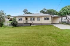 21 Taloumbi Street Maclean NSW 2463 $830,000 A very special opportunity to purchase this property in a prime location within the riverside township of Maclean. This flood free 1233m2 block offers dual street frontage off both Taloumbi Street and Taloumbi Lane. With a development consent in place for a two lot subdivision makes this a great investment opportunity. The block from the back of Taloumbi Lane offers a lovely outlook including river views and would be the perfect place to build in town. 21 Taloumbi Street, Maclean is a newly renovated neat and tidy 3 bedroom home with high ceilings set on an elevated block with a large fully fenced back yard. The home features 3 bedrooms all with built-in-robes and ceiling fans. The modern kitchen is bright and airy and offers a cooktop, large range hood and plenty of bench space. It is also open plan with a spacious family room and the 2nd lounge area is centrally located. The main bathroom has a large shower, vanity plus toilet and is located close to the bedrooms for added convenience. There is a 2nd toilet located in the large laundry area. There is a covered veranda area to the back of the home and a single car-port to the front. Potential rental income for this property is $530 to $550 per week This is the ideal Maclean location, within walking distance the the CBD and a short stroll the the fabulous Botero coffee Cafe.