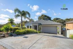 68 Gully Rd Seacliff Park SA 5049 $1,050,000 - $1,150,000 Feel at one with nature with this idyllic tree studded retreat – only minutes to all the wonderful amenities that this highly sought after location offers. Set amongst other quality homes near the end of a quiet cul-de-sac it is designed to exacting standards by Beechwood homes on a massive 927m2 allotment. The facade gives no indication of what lurks behind. Warm and welcoming throughout the layout is perfect for the larger family with three living areas – all with great light or views to the park like setting. The master bedroom with built in robes and ensuite is on the top level along with the double garage with direct access. The light and bright, north facing semi-formal lounge offers views of the Glenelg Coastline. It is also adjacent to the kitchen/living meaning that the cook is never far from the action. Kitchen offers gas hot plates and stainless steel appliances. Large glass doors allow the view to come in – whilst the timber deck lets you feel like you are in the Australian bush with a variety of flora and fauna that is so rare in today’s suburban infill. Downstairs the kids’ retreat with 2 more bedrooms, an open style lounge and bathroom allow them to have their own space away from the adults but still enjoying the bush views. Under house shed offers superb storage and with some additional work could be a fantastic work shop for the handyman. Not far from the beach, major shopping, transport and parks this one will be popular with those not wanting the cookie cutter approach to living in the “burbs”. A great mix – but don’t delay – this one will be popular.
