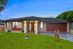 15 Palomino Ave Clyde North VIC 3978 $850,000 - $900,000 Exemplifying space and quality throughout, this Henley built home will not disappoint. Warmly welcomed by the brick and render façade and landscaped gardens, it only gets better once you step through the front door. Greeted with an extra wide hallway, spotted gum timber flooring, and the luxurious master suite to your left, this property will instantly feel like home. The master suite is ultra-spacious and features timber framed windows, a huge WIR, an enormous ensuite with separate shower, separate bath, and double his and her vanities, all making this space the ultimate parents' retreat. Continuing through the home you will notice a double door entry to your very own home office or third living space, before being presented with the heart of the home; the main living, dining and kitchen. A true chef's kitchen, boasting a 1200mm wide island with 40mm stone benchtops, 900mm oven and gas cooktop, stainless steel dishwasher, built in pantry, and plumbing to the fridge space. Surrounding the dreamy kitchen is your expansive and open plan living and dining. The living room has plenty of space for the whole family to tuck in and watch their favourite movies, while the dining space is light and airy and leads you to your alfresco via timber stacker doors. The picture perfect alfresco is perfect for year-round entertaining as the backyard features a northern aspect. With quality timber decking, blinds to keep you sheltered from the weather and grassed surrounds, it is the ideal spot for those summer BBQ's. The home also boasts a rear positioned theatre room, 3 further oversized bedrooms all with BIR's, family bathroom, powder room, a functional laundry, and an oversized double garage with rear roller door, providing an abundance of storage. Features: - Huge 1200mm kitchen island with 40mm stone benchtops - Feature timber windows and timber stacker doors - Massive 576sqm block with north facing yard - Luxurious master suite and ensuite featuring double vanities and separate bath - Spotted gum timber hardwood flooring throughout - Two distinct living zones and a study/third living - Zoned ducted heating and split system A/C to living and ensuite - Extra wide double garage with rear roller door and internal access - Alarm system and security cameras Conveniently located with Clyde Grand Reserve Playground only one house down, Selandra Rise Shopping Complex a 1-minute drive away, and Wilandra Rise Primary School and St Peter's College only an approximate 2 minutes' drive away, the lifestyle on offer doesn't get much better than this! You're also only a 3-minute walk away from the 798-bus route which takes you through to the Selandra Rise Shopping Complex, Casey Fields, Cranbourne Station, and the Cranbourne Park Shopping Centre.