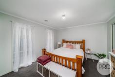 18 Walla Place Glenfield Park NSW 2650 $595,000 - $645,000 This oversized family home has been designed with low maintenance and family friendly comfort in mind. Some of the many extra features include: - Huge master bedroom with walk in robe and ensuite - A further three good sized bedrooms all with built in wardrobes - Three living areas, ensuring plenty of room for the whole family - Terrific open plan kitchen overlooking one of the living spaces and the dining area - Evaporative cooling and ducted gas heating - Great undercover entertainment area and a huge level yard - Double lock up garage with drive through access. Located in a quiet cul de sac surrounded by other family friendly homes and within a few minutes walk from South City Shopping Centre, this is sure to impress!