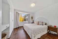24 Verbrugghen Street Melba ACT 2615 Whether you are a first home buyer, downsizer, young family or an investor, this light-filled and welcoming 3 bedroom home is sure to impress. The location offers comfort and convenience with nearby schools, bus stops, ovals and local shopping only moments away. Internally the floor plan boasts a spacious open plan kitchen, living and dining area. The kitchen itself is fully equipped with electric cooking, ample bench space and plenty of storage. The master bedroom comes complete with a double built-in robe, whilst the additional 2 bedrooms, one with built-in robe, are serviced by the stylishly updated main bathroom. Externally, you will find an impressive multi-tiered entertaining area including a covered deck - perfect for hosting friends and family in style. The added security of full fencing means you can simply sit back and relax whilst kids play and pets roam in a safe environment. Additional creature comforts include a split system unit, a renovated laundry room with external access and a single garage with remote control access. The home also has an additional driveway which is perfect for the boat, trailer or just extra parking. This beautifully presented home is ready and waiting for you to just move in and enjoy. We encourage you to see it for yourself before it is swept off the shelf. Features: Open plan design Lots of natural light Tasmanian Oak hardwood floors throughout Kitchen with electric cooking and ample bench space Master bedroom with double built-in robes and bay window with blackout curtains 2nd bedroom with built-in robe and roller blinds Spacious 3rd bedroom with roller blinds Updated main bathroom with matte black fixtures Separate toilet Split system unit installed Renovated laundry room with external access Multi-tiered outdoor entertaining area Covered deck Established veggie garden Under house storage 2nd driveway Large fully fenced backyard Single garage with remote control access