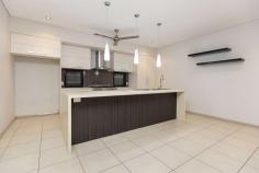 8 Dalmatio Street Bilingurr WA 6725 $775,000 Tucked away in the sought-after Waranyjarri Estate in Broome's newest and most vibrant community, this stunning 4 bed, 2 bath family home has it all. Purpose-built for modern family living, you'll love the beautifully crafted living areas both indoor and out, offering multiple options for entertaining. Spread over a large block the home mixes space with style offering open-plan living with a host of family-focused features from front to back. Plus, the home's unique pod design offers a separate, fully self-contained bedroom perfect for a teenager's retreat, visiting family or friends, or as an Air BnB delivering passive rental income. From the front, the large double carport has room for two large vehicles with an additional storeroom to the rear complete with roller door entry. Additional driveway parking is available together with gated side access for secure boat storage with your very own fish cleaning station and outdoor shower, perfect for returning after another successful fishing trip. Inside is sublime, boasting a light and bright interior with tiled flooring and plenty of natural light. Open-plan living and dining areas flow into the gorgeous modern kitchen complete with feature hanging lights, tiled splashbacks, stainless steel appliances and large breakfast bar with stone benchtops. Also located off the living area is a large theatre room that could also double up as a kids activity space. Other key features include a beautiful main bathroom, separate laundry, split-system air-conditioning, modern downlights, stainless steel ceiling fans throughout. The main home itself boasts 4 big bedrooms - all with built-in robes - including the spacious Master. The separate pod offers another self-contained bedroom offering owners unmatched flexibility. Seamlessly blending indoor/outdoor living, the expansive undercover alfresco area is the perfect entertaining space complete with feature polished timber-lined ceilings. When it's time to cool off, you can head to the fully-shaded, below ground pool, guaranteed to be a family favourite. Located close to Broome North Primary School and within walking distance of numerous local parks and amenities, this stunning home offers the ultimate location and lifestyle package.