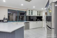 17 Landbeach Blvd Butler WA 6036 This super spacious family home stands proud in a central Brighton location with only a small walk to the lakes, shops and train station and offers space and serenity in abundance! The owners have spared no expense in making this a top of the range home… the extras are endless and they includes SIDE ACCESS FOR A BOAT OR CARAVAN, SOLAR POWER PANELS, ROLLER SHUTTERS, FRESH NEUTRAL DECOR AND AN AMAZING OUTDOOR ENTERTAINING AREA…!!! With huge street appeal, this impressive home has been designed & constructed to meet the needs of the growing family! If you’re looking for a property that you won’t outgrow in a hurry and love the great outdoors, then look no further…!!! Offering plenty of street appeal this imposing home is proudly perched on a huge 608m block looking out to beautifully manicured gardens and the front entry provides the perfect welcome home! The spacious master bedroom is nicely secluded at the front of the home and boasts his & hers walk in robes, roller shutters and the renovated ensuite features glass shower screens and upgraded tapwear and tiling. Rarely will you find a home that offers three additional queen sized bedrooms so prepare to be impressed! The kid’s bedrooms all have larger walk in robes and are well presented. Central to the home amongst all the action is the well-appointed chefs kitchen with upgraded cooking appliances, overhead storage, double fridge recess, plenty of bench and cupboard space, glass splash-backs and a shoppers entry! The extensive open plan living & dining is the ultimate place to spend time with the family & entertain guests. With so much space at your leisure you will never feel claustrophobic when it comes to social gatherings and with access to a superb outdoor entertainment area you really couldn’t ask for more! Once all the guests have gone home why not head to the home theatre, put a movie on and relax…!!! “THE GREAT OUTDOORS” – This beautiful outdoor paradise has to be seen to be fully appreciated! Offering complete privacy you’ll feel like your a million miles from the hustle & bustle of everyday life and the kids have a safe haven to play! With an alfresco plus extended patio completed with patio blinds you have the ultimate setting for BBQ’s & social gatherings. With the manicured lawns and gardens this is perfect…!!! The property allows rear access for parking all the toys and there is a garden shed. Extras Include: Double remote garage, solar power panels, huge laundry + big walk in linen, reverse cycle split system air-conditioning x2 plus ducted evaporative, roller shutters to various windows, mesh security screens and modern LED downlights. A LARGE HOME WITH HEAPS OF EXTRAS IN THE BEST LOCATION… !!!