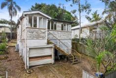 52 Lockhart St Woolloongabba QLD 4102 Has the time come to purchase a home that you can add value to? Opportunities rarely present themselves as good as this character home in one of Brisbane’s most talked about suburbs. Everyone is going to have their own pro/con list when they look at this home but whether you are first home buyer, up/downsizer, investor, or newbie/experienced house renovator, you won’t be the only one putting this home on your inspect list! Some features include: – Three good sized bedrooms – Huge enclosed front verandah/sunroom – Raised home with potential to do more underneath – Character to work with! High ceilings, original windows, VJ’s HJ’s & fretwork – Timber floors throughout – Simple kitchen with electric oven & gas cooktop – Central bathroom – Fully fenced 405m2 lot (with new boundary fence being built with the neighbours) – Single lock-up garage – NBN access Woolloongabba is a suburb that has taken off, it makes sense after considering its proximity to the CBD and The Gabba. Location features include: – 550m to Park Road train station -750m to Coles, barber, gym, bar and much more at the Gabba Central complex – 800m to Woolloongabba bus station (Soon to be site for the Cross River Rail) – 800m to The Mater hospital – 900m to The Gabba (Future Site of the 2032 Olympic games) – 1000m to Dutton Park State – 1100m Briabsne South State Secondary College – 1300m to Kangaroo Point cliff walk – 2100m to South Bank Parklands – 2100m to Brisbane State High School – 2400m to Queensland Performing arts Centre
