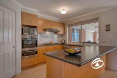 33 Oaklands Way Pakenham VIC 3810 $700,000 - $770,000 Timeless in style and beautifully presented this family home, neatly tucked away in a prime pocket of Lakeside is perfect for all buyers who have been searching for a trustworthy, forever home. Sitting on a large 694sqm corner allotment with immediate street appeal this versatile floorplan offers that can be configured to a multitude of requirements. The master suite offers a dressing room and ensuite featuring a double shower and corner spa. Two more bedrooms at the rear of the home feature built-in robes serviced by a family bathroom and a separate toilet. Further emphasizing its fine family credentials is a large front formal lounge, well-appointed kitchen with adjoining living/dining area, plus the added bonus of an additional rumpus/theatre room (optional 4th bedroom). Completing the picture is a huge covered outdoor entertaining area that overlooks the manicured rear lawn and border gardens Add a remote-control double garage with drive-thru access, additional side access for the boat/caravan, solar panels, water tank and two sheds. Close by to local shopping, schools, public transport and some of Pakenham’s best amenities, this one won't hang around for long.