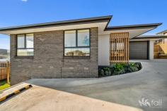 2/4 Rosalie Place HOWRAH TAS 7018 $625,000 Spacious Near New Villa Unit in Convenient Location Conveniently located in a newly developed section of Howrah Gardens, this near new quality built villa is just minutes walk from the new Glebe Hill shopping complex and 15 minutes from Hobart’s CBD and Salamanca in one direction and Hobart’s International Airport the another. The villa, immaculate in every way, has a spacious north facing open plan kitchen, dining and living area which in turn leads directly out, through sliding glass doors, to a fantastic sundeck. The kitchen is finished with stone bench tops and quality stainless steel appliances with a sleek black kitchen sink and tapware. There are three generously sized bedrooms, a bathroom, and a second separate toilet with basin. The laundry is positioned at the back of the garage which offers a remote automatic panel lift door. This wonderful villa, one of only two on the block, is ready and waiting for its new owners to start making their own memories here. Whether you are a family looking to settle in a great location, looking to downsize, first home buyers waiting to purchase a fantastic property or an investor wanting to add to their portfolio, this near new villa is not to be missed. ADDITIONAL FEATURES INCLUDE • Reverse cycle air conditioning for efficient cooling and heating • Double glazed windows and energy efficient LED lighting • Low maintenance brick and colorbond roof construction • Spacious open plan, sun-filled living area • Sundeck off the living room with glass balustrade • All bedrooms have built-in wardrobes • Family bathroom plus seperate second toilet with basin • Featuring a neutral pallet throughout • Off-street parking + lock up garage • Fantastic storage under the house