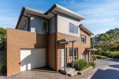 2/30 Robertson Street Helensburgh NSW 2508 This beautifully presented duplex is perfectly appointed to enjoy low maintenance indoor/outdoor living in a quiet, yet convenient location. It is set in a boutique complex of four, within walking distance of town centre with shops and cafes , local schools, parklands and public transport. Open plan living enjoys an abundance of natural light. Modern kitchen features stainless steel appliances and ample cupboard space Glass doors allow seamless access to the alfresco patio area and low maintenance yard. Three spacious bedrooms, with BIR's The master complete with ensuite Spacious family bathroom Ducted air conditioning throughout Remote garaging with internal access and abundance of storage Perfectly positioned in a walk to everything location Stunning Stanwell Park Beach is less than a 10 minutes drive. Enjoy Coastal living without the huge price tag. Helensburgh is one of the only remaining areas where you can find a peaceful regional lifestyle less than an hour from Sydney. It offers all of those charming lifestyle benefits that one would associate with small town living:- bushwalking, swimming holes, bike tracks, sporting clubs, cafes and of course plenty of friendly people.