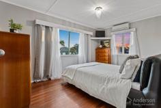1 Esker St Pinkenba QLD 4008 $800,000 A small country town feel just 16km from the heart of Brisbane – that’s what you get with this extensively renovated highset Queenslander sitting on a massive 1004m2 corner block. The highset home comprises three good-sized bedrooms, one with a built-in robe, a bathroom with a separate shower, bath, and toilet, and an open plan living, dining, and kitchen area that opens onto a balcony. Downstairs you will find the laundry room with a toilet and shower and an extensive multipurpose/utility area. Beautiful timber floorboards flow through the upstairs area, while fretwork,VJ walls, and a smart choice in paint colour give this home the perfect blend of classic Queenslander charm and modern comfort. Window furnishings complete the picture. Extensive renovations mean the work has been done for you! The property has been professionally surveyed, and exterior renovations include roof restoration with a lifetime guarantee, new Colorbond guttering and down pipes, stormwater drainage installation and new water main from meter to house, a fresh coat of paint, security lights, new concrete paths and driveway, and footings under the perimeter of the driveway allowing for future approved carport with electrical conduit already installed. Inside, you will find a full kitchen and bathroom renovation, including a partial plumbing and drainage upgrade, air conditioning systems on both levels that discharge into storm drains, a recently replaced electric hot water system (4 years), and upgrades to the utility area under the house. The huge backyard has enough space to add a pool, an alfresco area, extend the house, and have room for the kids to play a game of backyard cricket and the dog to run around on the grass. Framed by an established garden, an irrigation system for the lawn ensures upkeep is very low maintenance. Situated in the little pocket of Pinkenba, keen fishermen and boaties will love that the boat ramp is just two minutes down the road, giving you direct access to Moreton Bay, Moreton Island, and St Helena Island. Do you drive around Brisbane for work? Pinkenba provides excellent connectivity to all parts of the city with the nearby inner-city bypass and east-west arterial tunnels, connecting you to the east, west, and southern suburbs and the Gateway arterial. The International and Domestic Airports are also nearby, perfect for the frequent traveller. DFO and Woolworths are just a 10-minute drive away for all your shopping needs, while Hamilton Wharf, with its famed Eat Street and City Cat ferries, is also a 10-minute drive. This property is ready for you to move in straight away, so whether you’re an owner-occupier or an investor, you will want to add it to your ‘must-see’ list. OUR FAVOURITE FEATURES : • Renovated highset Queenlander on 1004m2 block • Country-town feel only 16km from Brisbane CBD • 3 beds + 1 bath + WC + open living, dining, kitchen • Downstairs laundry with toilet + updated utility area • Timber floorboards, renovated kitchen & bathroom • Air conditioning & window furnishings throughout • Renovated roof, new guttering, new stormwater drainage • New paths & driveway, new lights, fresh coat of paint • Backyard fully fenced – new fence & automatic gate • Huge backyard, low maintenance gardens, irrigation • Near boat ramp, easy boat access to Moreton Bay • Close to arterial roads for excellent city connectivity • 10 mins to Woolworths & DFO, Hamilton Wharf • Ready now – great first home or investment property