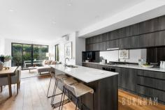 94 Alexander St Footscray VIC 3011 $850,000 - $900,000 This modern, cosmopolitan home fuses contemporary and low maintenance living to create the ultimate townhouse lifestyle. Located in the burgeoning suburb of Seddon, with its own street frontage, the value and appeal of this home is only set to grow. Upon entry to the home, you are greeted with bright spaces and impressive timber floors. The open plan living and dining area is an entertainer’s dream, this zone opens to the private courtyard, creating a peaceful ambience by bringing the outdoors in. The heart of the home, the kitchen, is sure to impress with grand proportions. It features a smoke mirror splashback, gas cooktop, stone benchtops, a double sink, island bench/breakfast bar, and ample storage space. The lower level is completed by a light-filled study, allowing for pleasant work from home situations. The airy master suite on the upper level is serviced by an ensuite with a large shower and vanity with storage. The second bedroom has ample space and overlooks the street below, making it the perfect place to unwind after a long day. This bedroom is serviced by the central bathroom that is wrapped with neutral tones and features a shower and vanity with storage. Located approximately 8kms from the city, enjoy an abundance of amenities at your doorstep. Middle and West Footscray train station, parklands, Victoria and Charles street shops and cafes, Footscray city and numerous schools are within a short walk. Additional features: – European laundry – Split system heating and cooling in the bedrooms and living area – Carport – Private courtyard