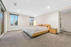 101 Shannon Street Box Hill North VIC 3129 With a grand façade, this well-kept four-bedroom family home is light-filled, bright and features high ceilings, this home is welcoming from the start. Behind a secure front fence and vehicle access gate, there's a long driveway for off-street vehicle parking large enough for a recreational vehicle or multiple cars. A double car garage provides secure, off-street parking. Inside, separate living areas upstairs and down provide ample space for everyone to truly enjoy the home. A modern kitchen features an island-style stone benchtop, a 900 mm gas cooktop and dishwasher for easy cleanup. Ample bench and butler's pantry provide storage for all your kitchen essentials. A downstairs master suite is perfect for multigenerational living or a guest room as it includes a walk-through robe as well as a private ensuite with double vanity, separate WC and bathtub. An additional separate powder room is also located downstairs. Ideal for the family that loves to entertain, enjoy two undercover areas with L-shaped decking for hosting family gatherings as well as a large yard for children and pets to play. The super-sized upstairs master bedroom features access to a private, decked balcony as well as a private ensuite with double vanity, luxury spa bath and walk-in robe. The remaining bedrooms are carpeted for comfort and all feature walk-in robes and private ensuites. Enjoy the added benefits of ducted heating, air conditioning, a large dedicated laundry area with walk-in linen storage, halogen downlighting and decorative pendant lighting as well as a security system with cameras for added peace of mind. Just a short drive to Westfield Doncaster and you'll be surrounded by desired local schools such as Koonung and Box Hill Senior Secondary Colleges and Box Hill North Primary School. Walking distance to Box Hill Hospital and Centro, local sporting and garden reserves such as Mont Albert and Hagenauer is just a short stroll away.
