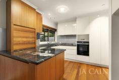 Unit 1/16 Dunloe Ave Mont Albert North VIC 3129 $890,000 Perfectly perched with an exceptional vantage point on the tree-lined corner of Hawkins Avenue, this residence features rare attributes with its own driveway and extensive yards to create a property of desire with a true sense of home. Polished floorboards adorn the well-designed plan which commences through entrance hallway that leads to expansive lounge and dining room which enjoys delightful outlooks to ample yet private gardens. Adjoining the open plan living zones is the fully equipped kitchen that includes stone benchtops, soft closing drawers and plenty of cupboard space. Two generous bedrooms both have built in robes with main including ensuite. Main bathroom, separate w/c and separate laundry provide further convenience. A highlight of the property is the north/west facing private courtyard which allows for entertaining or quiet enjoyment in a peaceful setting. Access internally through courtyard into double garage is an added bonus. Just some of a long list of inclusions are ducted heating, split system air conditioning, secure entry, alarm system, double glazed windows, solar power, water tanks etc. This serene yet supremely convenient location is only moments from Mont Albert Reserve with Box Hill Secondary and Hospital within easy access. Nearby is Box Hill Centro, train station, cafes and endless shopping options.